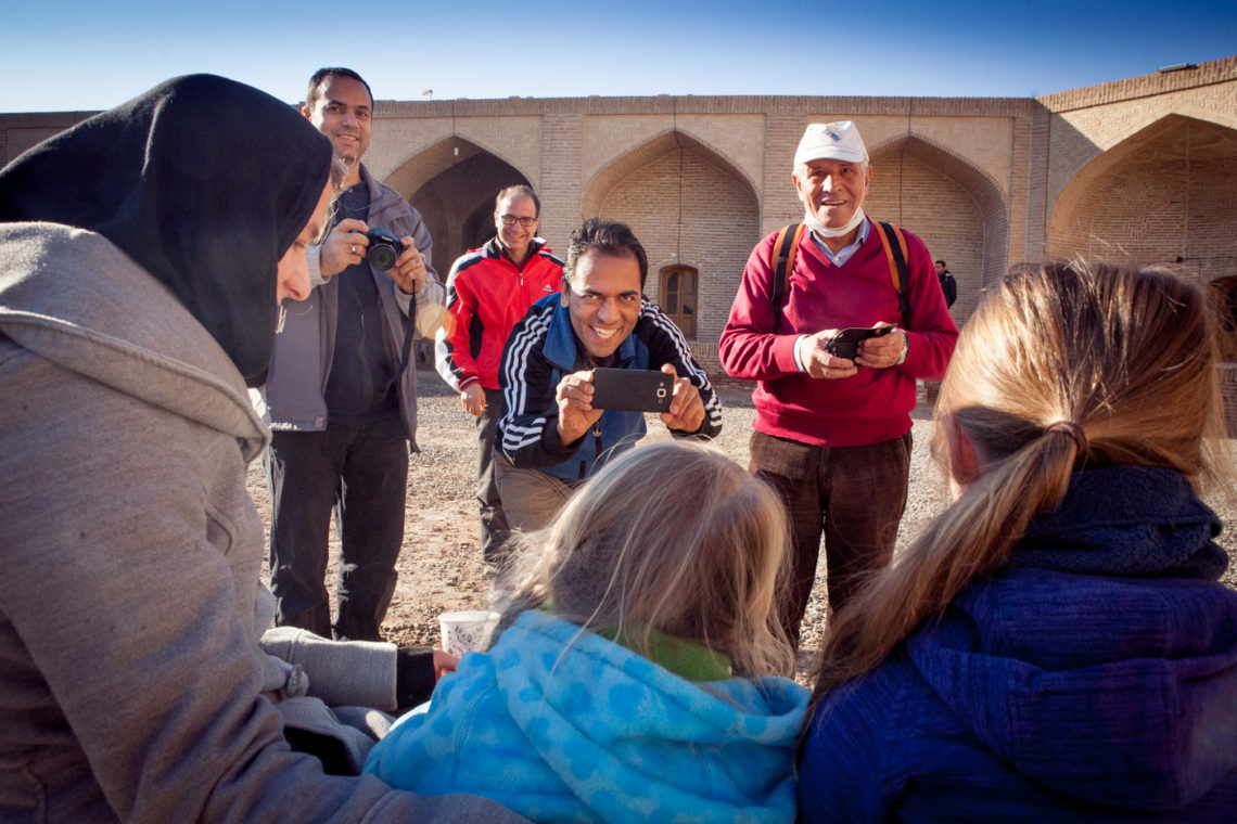 Iranian show hospitality to tourists children