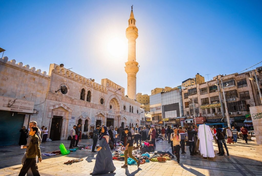 People walking in a busy street in Amman, Jordan