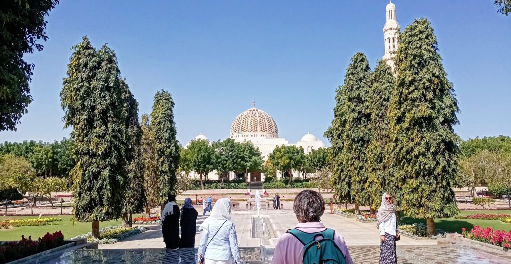 People walking in a garden, Muscat